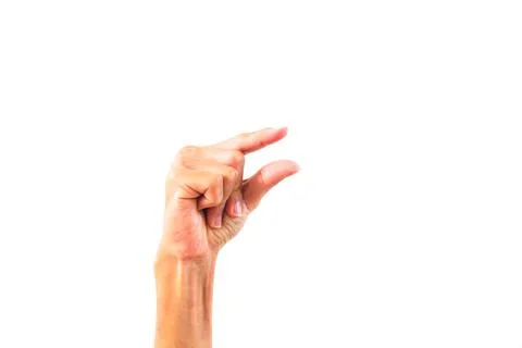 Close-up of a human hand showing a stop sign against a plain white backgrou.. Foto stock