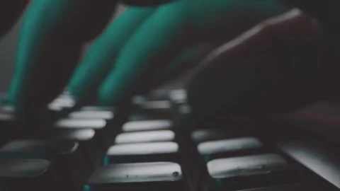 Close-up of human hand typing on computer keyboard with fingers pressing bl.. Stock Footage 337406099