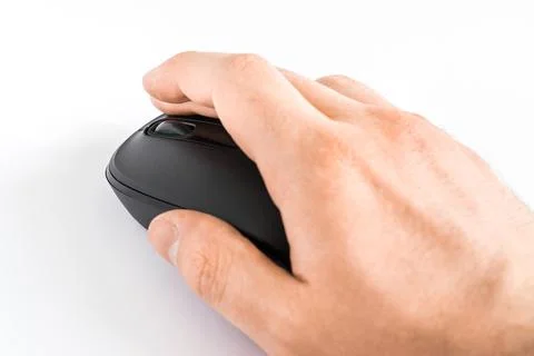 Close-up of a human hand while using a computer mouse on a white background Stockfoto's