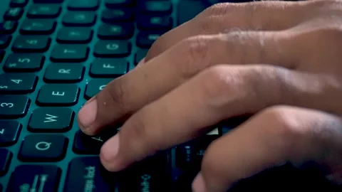 Close up of human hands actively typing on a laptop computer keyboard, capt.. Stock Footage 340489654