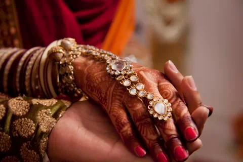 Close-up of human hands holding each other Stock Photos