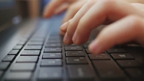 Close-up of human hands typing on the keyboard Stock Footage 72873886