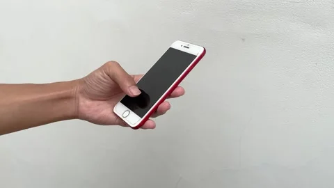 Close up of human hands typing text message and scrolling on smartphone screen Vídeo Stock 330514744