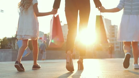 Close up of human legs, two small girls walking down street in stylish shoes 스톡 동영상 139230220