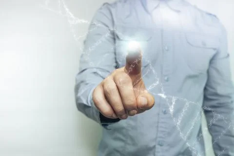 Close up of human Touching DNA molecule on a white background.. Mixed media. Stock Photos