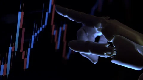 Close up of humanoid robot hand analyzing economic financial charts Stock Footage 337963692