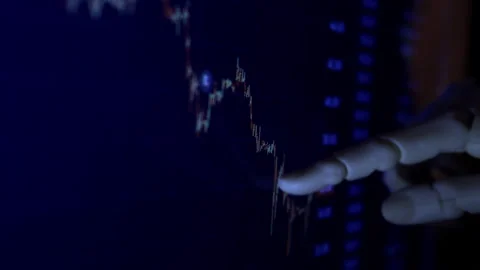 Close up of humanoid robot hand analyzing economic financial charts Stock Footage 337964155