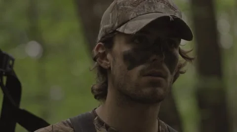 Close up of Hunter in Tree Stand shooting a Compound Bow. Stock-Footage 53644719