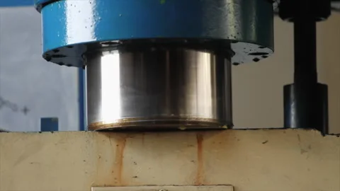 Close-up of hydraulic press piston in operation Stock Footage 317254087