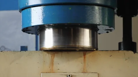 Close-up of hydraulic press piston in operation Stock Footage 317254108