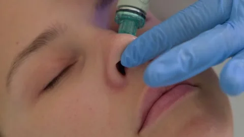 Close-up hydro peeling procedure for beautiful woman in cosmetology clinic. Stock Footage 253976838