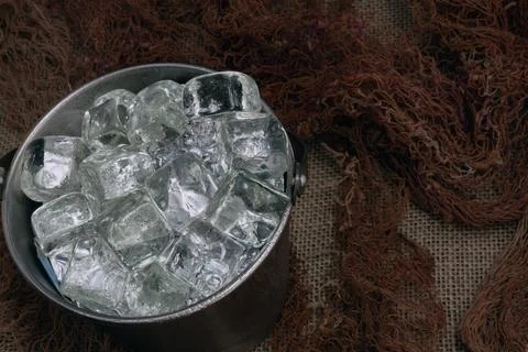 Close-up of ice bucket on rustic background (4) Stock Photos