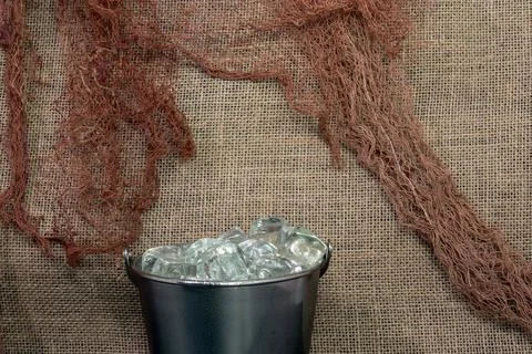 Close-up of ice bucket on rustic background (2) Stock Photos