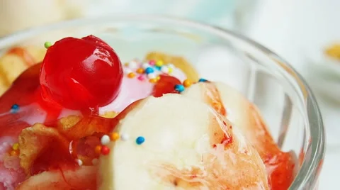 Close up of ice cream being spoon scooped Stock Footage 48566902