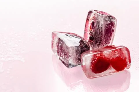 Close up of ice cubes with berries Stock Photos