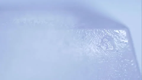 Close-up of ice melting. Time-lapse video. Stock Footage 159658205