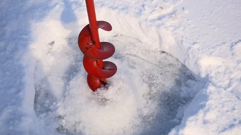 Close-Up Of Ice Screws Drill Hole In The Ice For Winter Fishing Stock Footage 92069492
