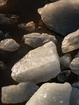 Close up of ice stacks in vertical image of Ice stacks at Vineyard Beach on.. Stock Photos