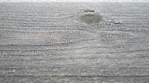 Close up ice on wooden surface. Video stock 147123804