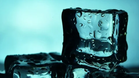 Close up iced cube with water drop rotation Stock Footage 107804743