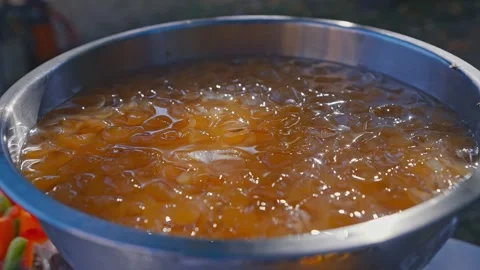 Close Up of Iced Fruit Punch in Stainless Steel Beverage Bowl.mov Stock Footage 340406551