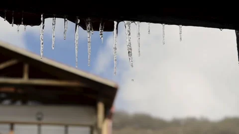 Close up of icicles on a roof Stock Footage 280921599