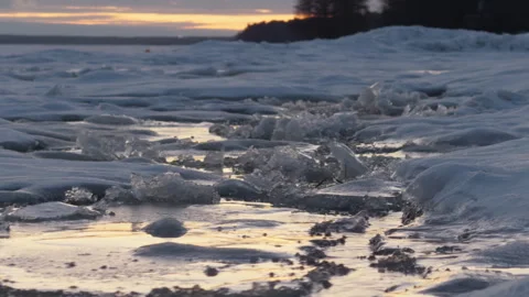 Close up icy snow white layers of glacier cracked by their spring warming and Stock Footage 309016675