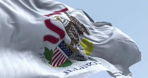 Close-up of the Illinois state flag waving in the wind on a clear day Stock Footage 265437713