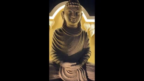 Close Up of Illuminated Buddha Statue at Night for Meditation and Spirituality Video stock 337983067