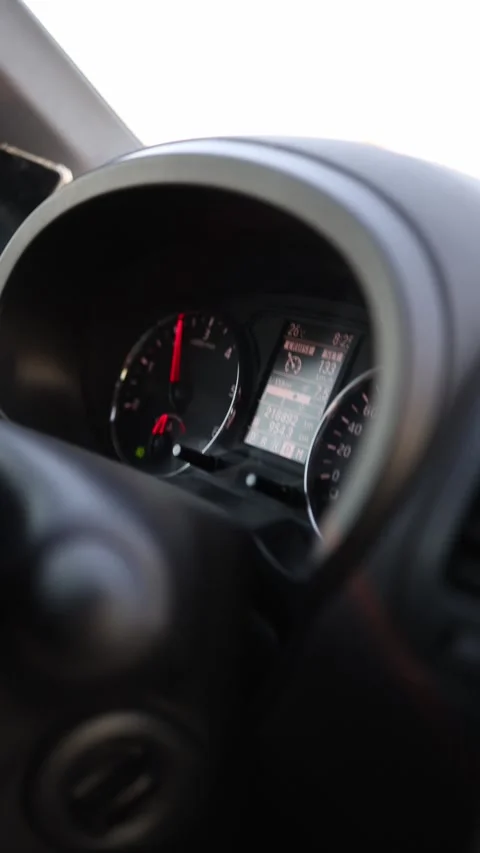Close up of illuminated car dashboard and tachometer while driving on highway 스톡 동영상 341621942