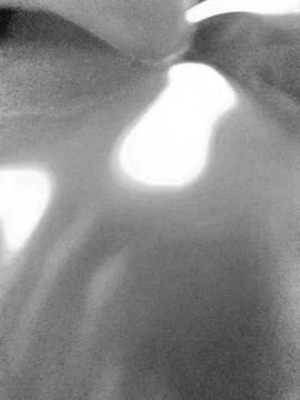 Close up of illuminated oval LED light on gray textured surface Illustrazione stock