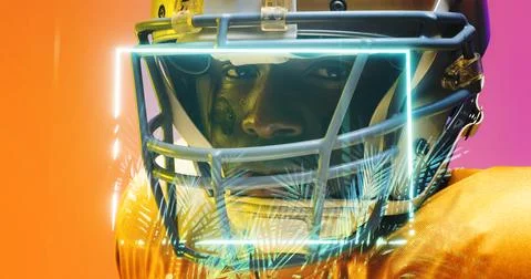 Close-up of illuminated rectangle and plants over portrait of american football Stock Photos