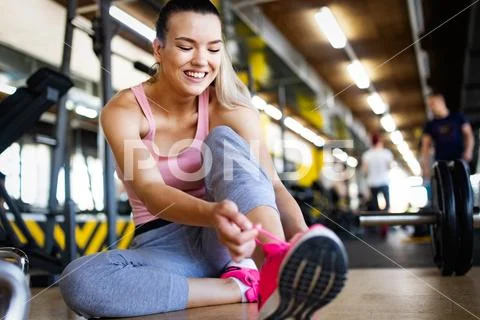 Close up image of attractive fit woman in gym Stock Photos