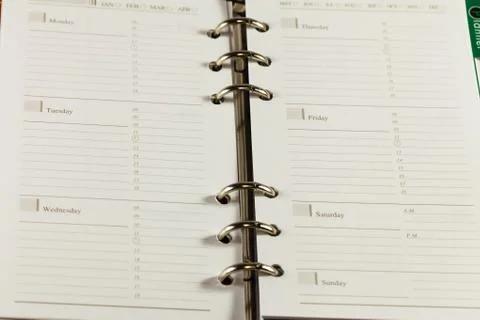 Close up image of black note book organizer against white background Stock Photos