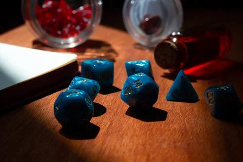 Close-up image of blue marbled role-playing gaming dice Stock Photos