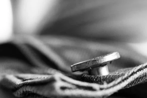 A close up image of the button and stitching on a pair of jeans, macro Stock Photos