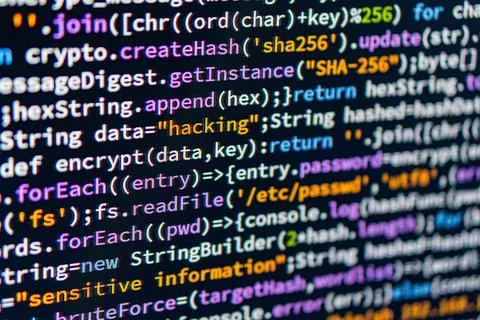 A close-up image of a C code snippet on a computer screen, highlighted usin.. Stockfoto's