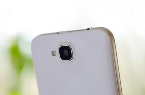 Close Up Image of the Camera of White Smart Phone 库存照片