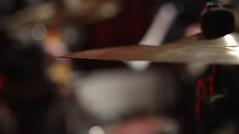 A close-up image captures the intense moment a drummer strikes the cymbals Stock Footage 315242939