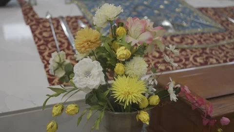 A close-up image of a colorful bouquet with various flowers, arranged in a vase Stock Footage 305292995