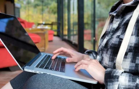 Close up Image of Computer and Hand of Person touching keyboard Stock Photos