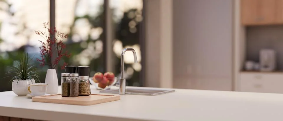Close-up image of a copy space on a modern white kitchen island in a modern.. Stock Illustration