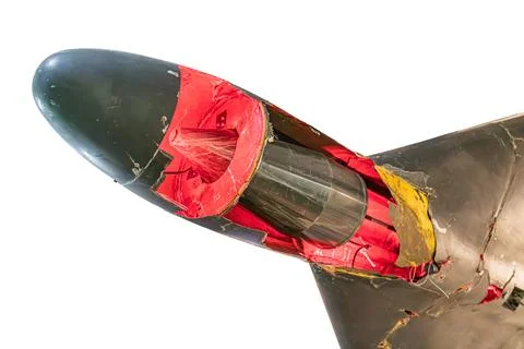 Close-up image of a damaged Russian drone, featuring a torn red protective .. Stock Photos