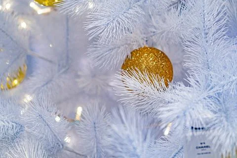 Close-up image of a decorated Christmas tree with artificial snowflake and me Stock Photos