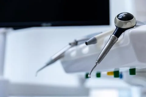 Close-up Image of Dental Instruments Positioned on a Treatment Table in a Modern Stock Photos