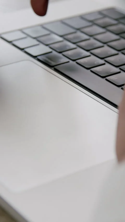 Close-up image of the details of a modern computer keyboard. The hands of a Stock Footage 316603918