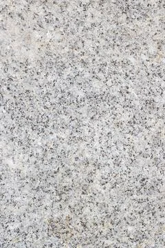 A close up image displaying a textured gray granite surface 스톡 사진