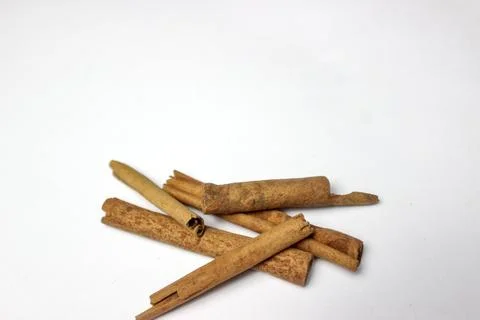 Close-up image of dried cinnamon isolated on white background. 스톡 사진