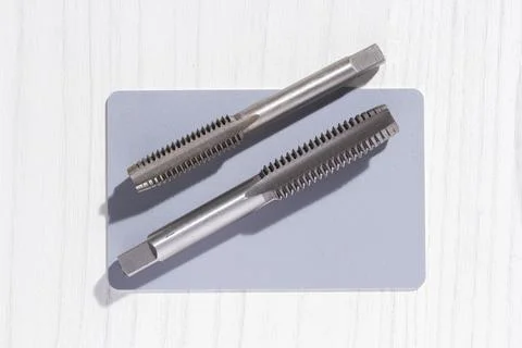 Close-up image of drill bit, or tap for threads in steel Stock Photos