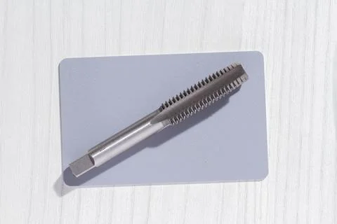 Close-up image of drill bit, or tap for threads in steel Stock Photos
